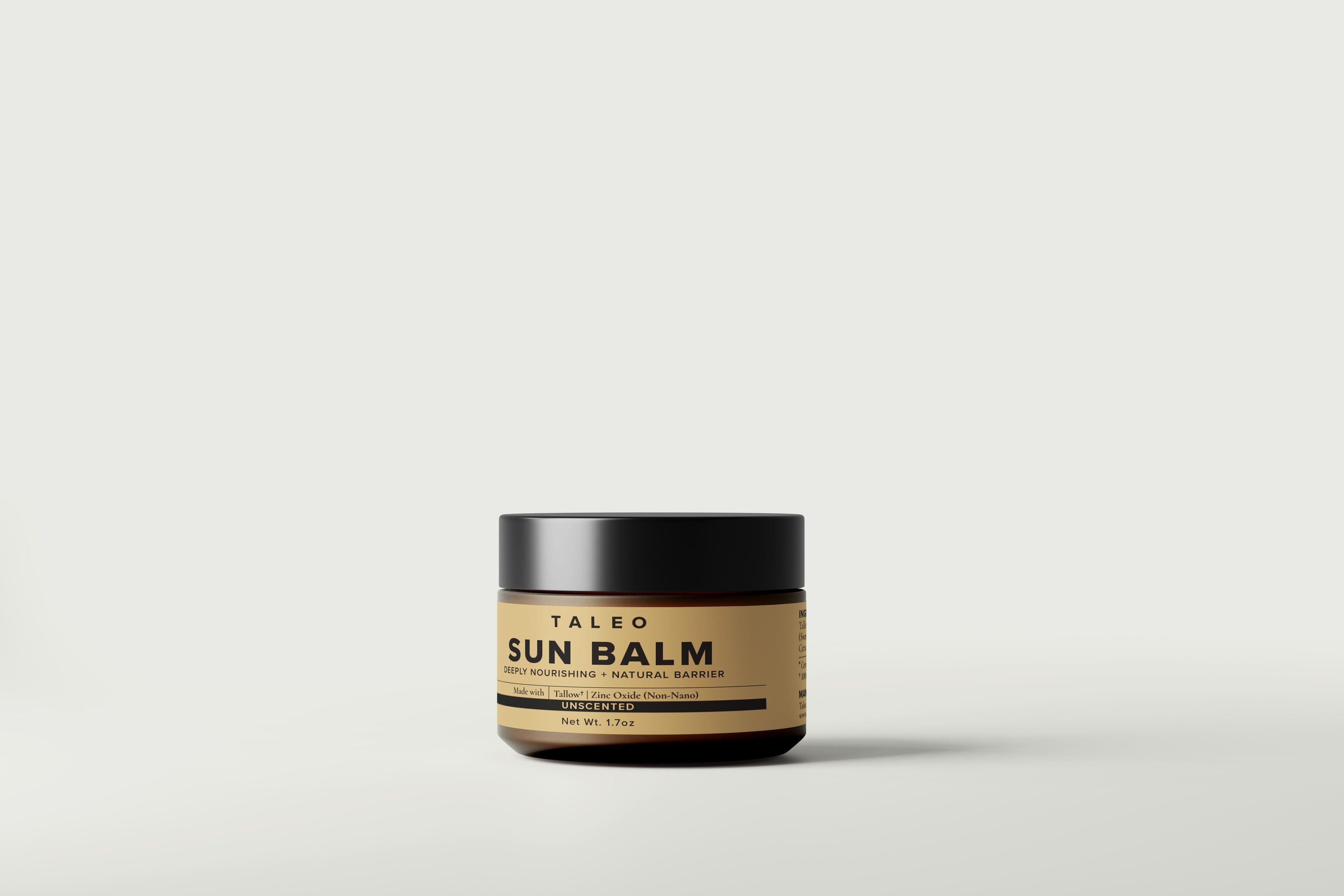 Taleo Sun Balm in amber glass jar with black lid and gold label – unscented natural sunscreen made with grass-fed tallow and non-nano zinc oxide, 1.7oz