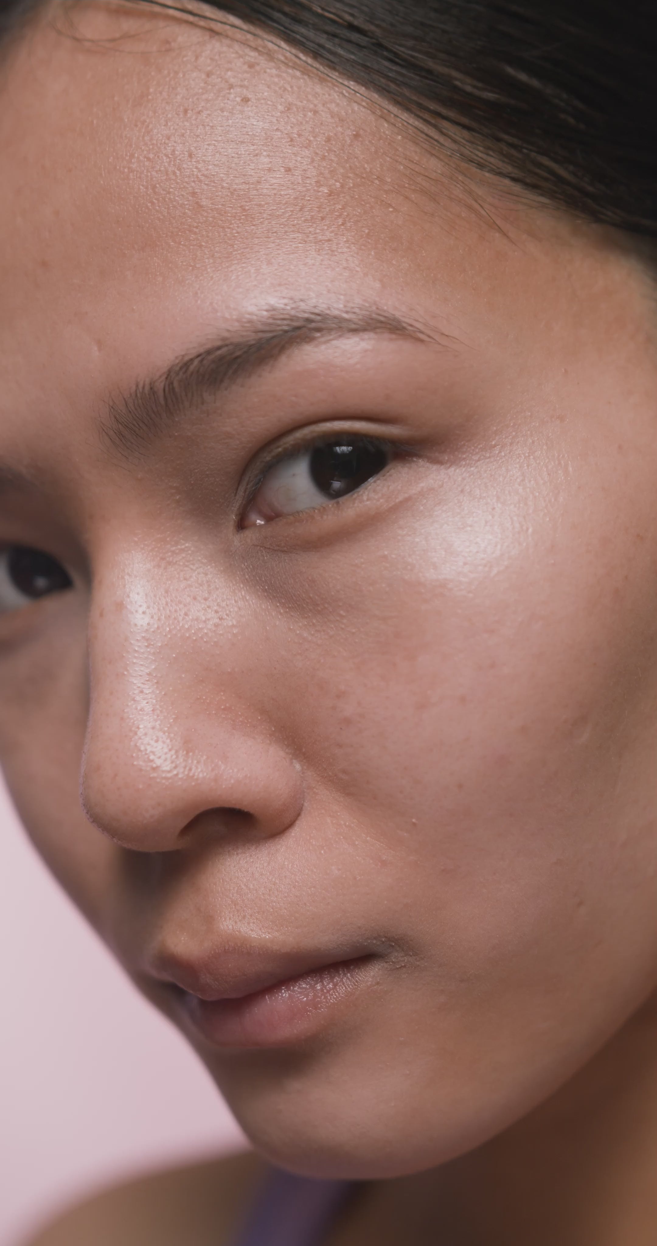Person applying TALEO Sun Balm to face — natural tallow-based mineral sun protection